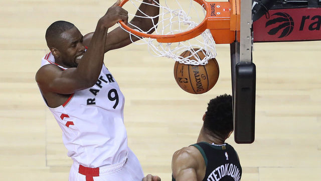 TORONTO, ON- MAY 25 - Toronto Raptors center Serge Ibaka (9) dunks over Milwaukee Bucks forward Giannis Antetokounmpo (34) as the Toronto Raptors play the Milwaukee Bucks in game six of the NBA Eastern Conference Final in Toronto. May 25, 2019. (Steve Russell/Toronto Star via Getty Images)