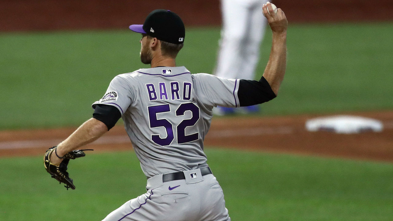 ARLINGTON, TEXAS - JULY 25: Daniel Bard #52 of the Colorado Rockies throws against the Texas Rangers in the fifth inning at Globe Life Field on July 25, 2020 in Arlington, Texas. The 2020 season had been postponed since March due to the COVID-19 pandemic.