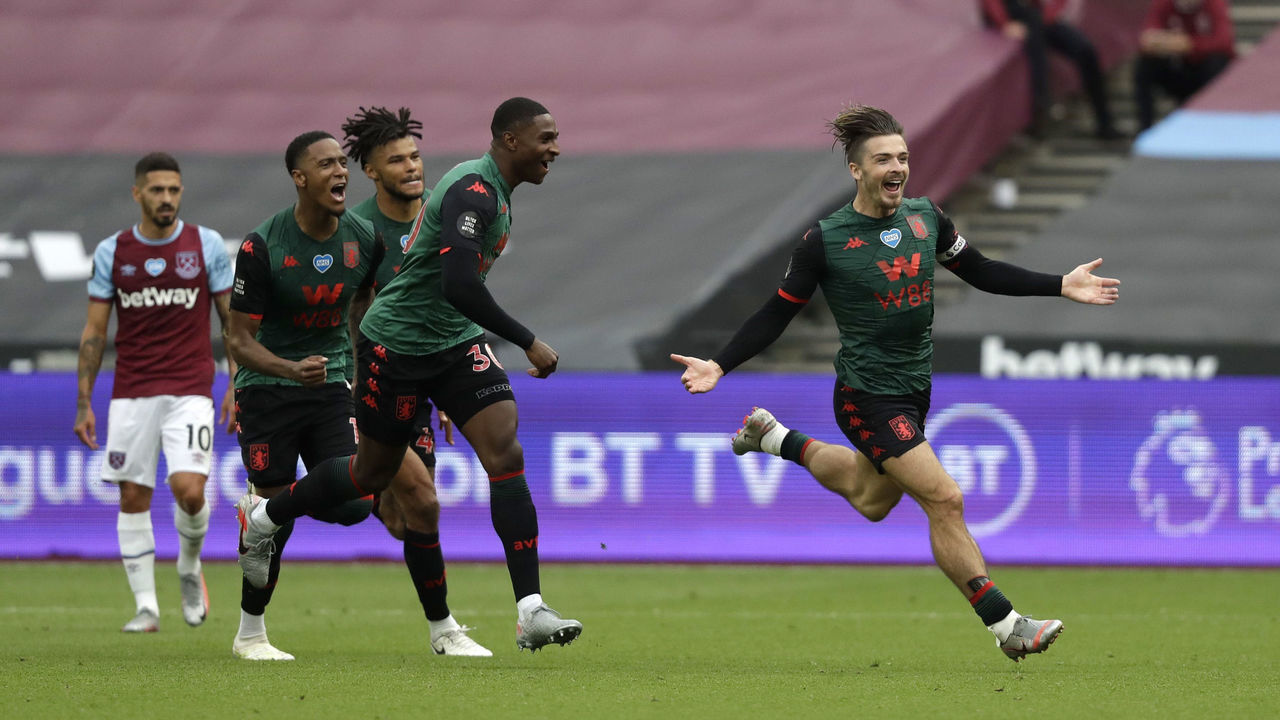 LONDON, ENGLAND - JULY 26: Jack Grealish of Aston Villa celebrates after scoring his team's first goal during the Premier League match between West Ham United and Aston Villa at London Stadium on July 26, 2020 in London, England. Football Stadiums around Europe remain empty due to the Coronavirus Pandemic as Government social distancing laws prohibit fans inside venues resulting in all fixtures being played behind closed doors.