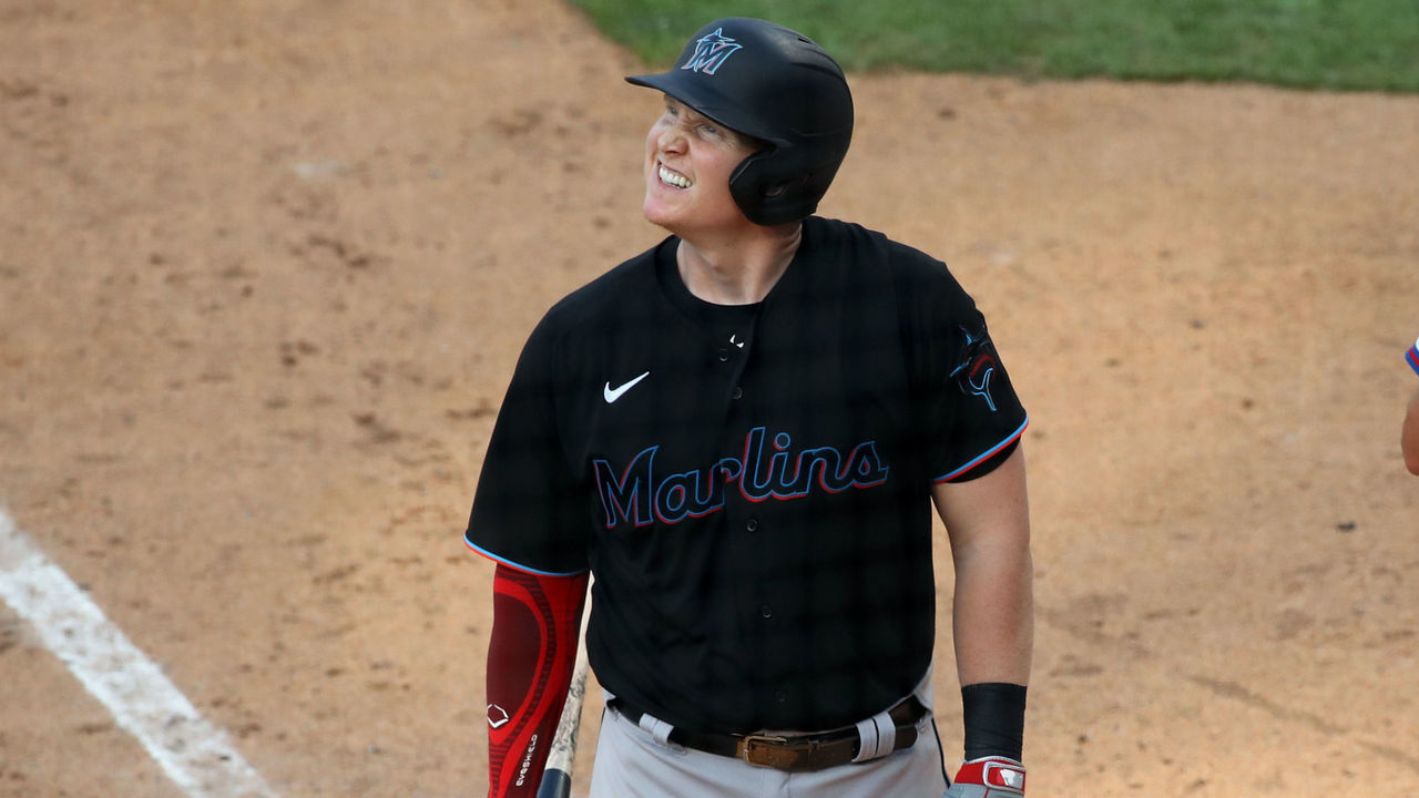 PHILADELPHIA, PA - JULY 25: Marlins 1B Garrett Cooper (26) winces after contact with a foul ball in the seventh inning during the game between the Miami Marlins and Philadelphia Phillies on July 25, 2020 at Citizens Bank Park in Philadelphia, PA.