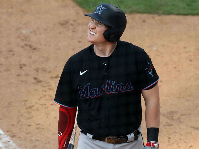 PHILADELPHIA, PA - JULY 25: Marlins 1B Garrett Cooper (26) winces after contact with a foul ball in the seventh inning during the game between the Miami Marlins and Philadelphia Phillies on July 25, 2020 at Citizens Bank Park in Philadelphia, PA.