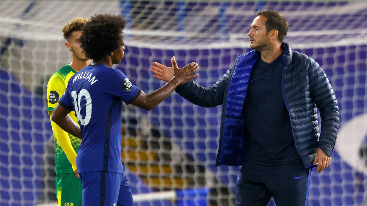 LONDON, ENGLAND - JULY 14: Willian shakes hands with Frank Lampard, Manager of Chelsea after victory during the Premier League match between Chelsea FC and Norwich City at Stamford Bridge on July 14, 2020 in London, England. Football Stadiums around Europe remain empty due to the Coronavirus Pandemic as Government social distancing laws prohibit fans inside venues resulting in all fixtures being played behind closed doors.