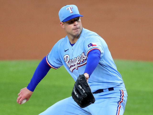 ARLINGTON, TEXAS - JULY 26: Corey Kluber (28) of the Texas Rangers pitches against the Colorado Rockies in the top of the first inning at Globe Life Field on July 26, 2020 in Arlington, Texas.