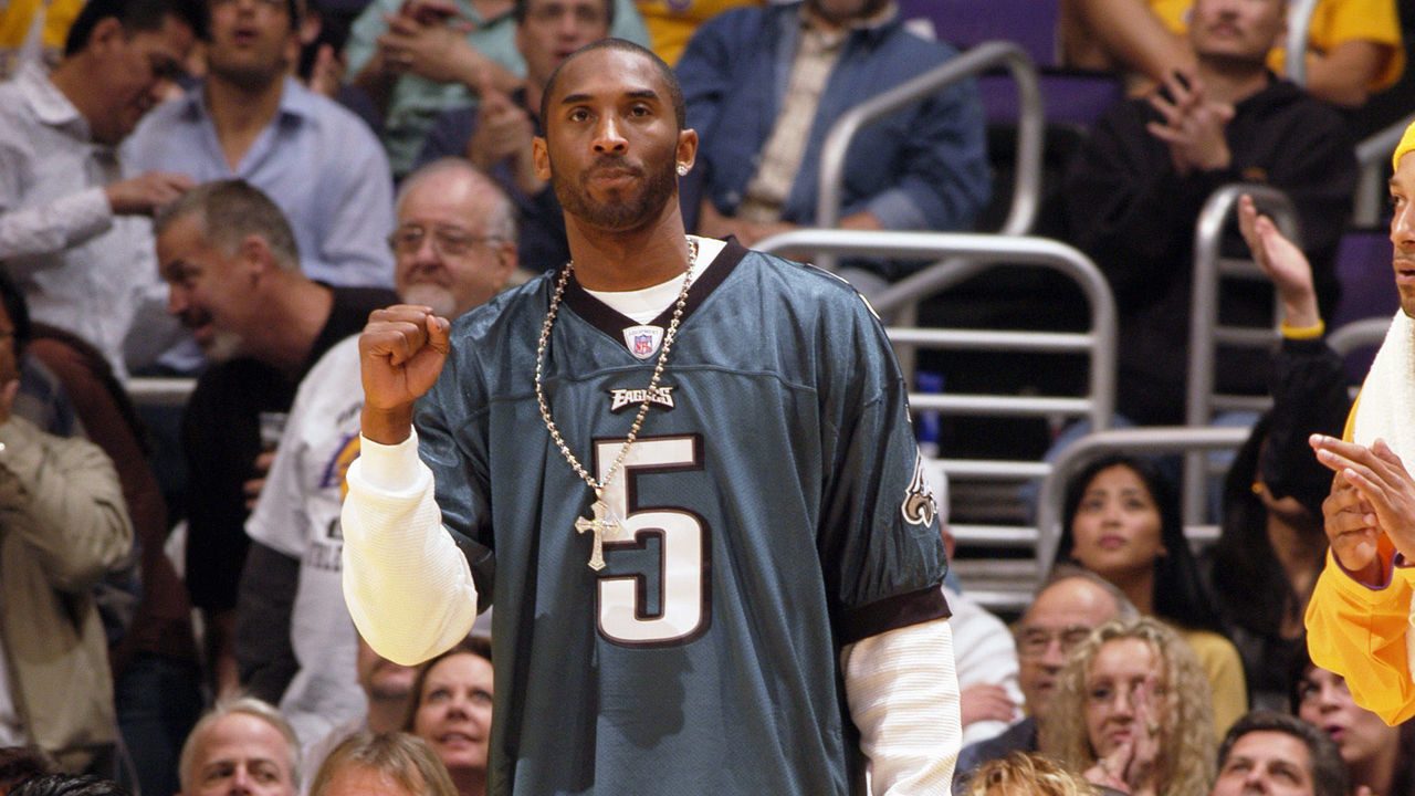 LOS ANGELES - FEBRUARY 3: Kobe Bryant #8 of the Los Angeles Lakers wears quarterback Donovan McNabb's #5 Philadelphia Eagles jersey during the game against the San Antonio Spurs on February 3, 2005 at the Staples Center in Los Angeles, California. The Spurs won 103-91. NOTE TO USER: User expressly acknowledges and agrees that, by downloading and/or using this photograph, User is consenting to the terms and conditions of Getty Images License Agreement. Mandatory Copyright Notice: Copyright 2005 NBAE