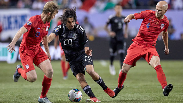 CHICAGO, IL - JULY 07: Mexico forward Rodolfo Pizarro (20) battles with United States defender Tim Ream (13) and United States midfielder Michael Bradley (4) during the CONCACAF Gold Cup final match between the United States and Mexico on July 07, 2019, at Soldier Field in Chicago, IL.