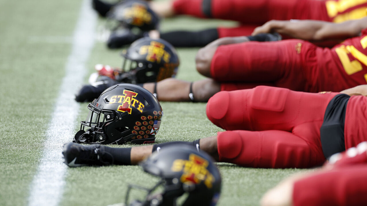 ORLANDO, FL - DECEMBER 28: General view of Iowa State Cyclones helmets on the field as the team stretches prior to the Camping World Bowl against the Notre Dame Fighting Irish at Camping World Stadium on December 28, 2019 in Orlando, Florida. Notre Dame defeated Iowa State 33-9.