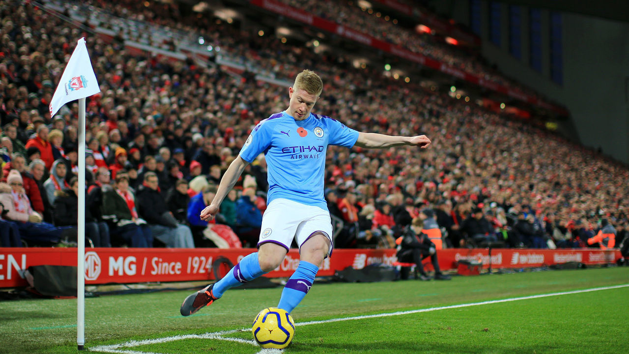 LIVERPOOL, ENGLAND - NOVEMBER 10: Kevin De Bruyne of Manchester City takes a corner kick during the Premier League match between Liverpool FC and Manchester City at Anfield on November 10, 2019 in Liverpool, United Kingdom.
