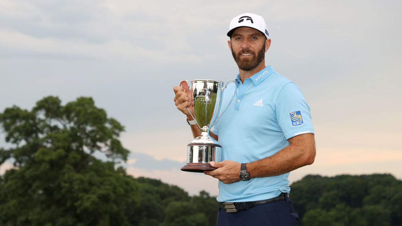 CROMWELL, CONNECTICUT - JUNE 28: Dustin Johnson of the United States poses with the trophy after winning the Travelers Championship at TPC River Highlands on June 28, 2020 in Cromwell, Connecticut.