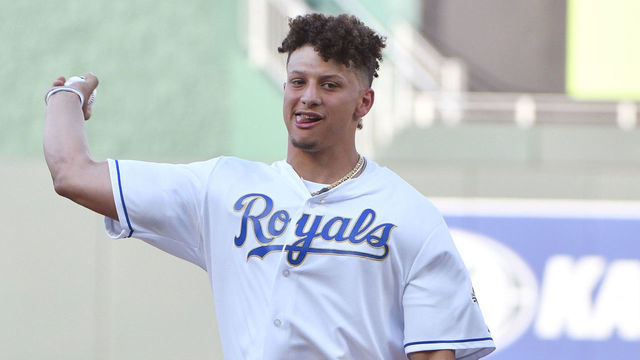 KANSAS CITY, MO - MAY 18: Quarterback Patrick Mahomes of the Kansas City Chiefs throws out the first pitch prior to a game between the New York Yankees and Kansas City Royals at Kauffman Stadium on May 18, 2018 in Kansas City, Missouri.
