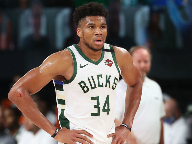 Orlando, FL - JULY 27: Giannis Antetokounmpo #34 of the Milwaukee Bucks handles the ball against the New Orleans Pelicans during a scrimmage on July 27, 2020 at The Arena at ESPN Wide World of Sports in Orlando, Florida. NOTE TO USER: User expressly acknowledges and agrees that, by downloading and/or using this Photograph, user is consenting to the terms and conditions of the Getty Images License Agreement. Mandatory Copyright Notice: Copyright 2020 NBAE