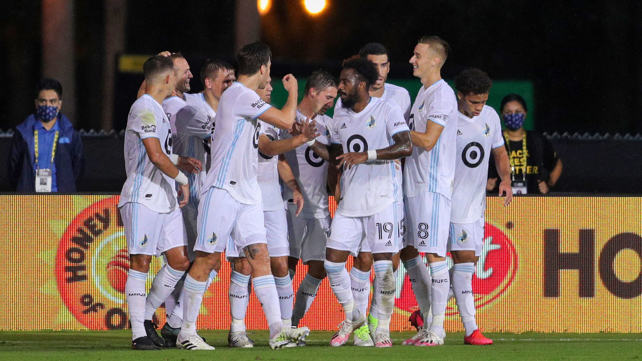 ORLANDO, FL - JULY 28: Minnesota players celebrate after scoring a goal during the soccer match between the Columbus Crew and Minnesota United on July 28, 2020, at ESPN Wide World of Sports Complex in Orlando, FL.