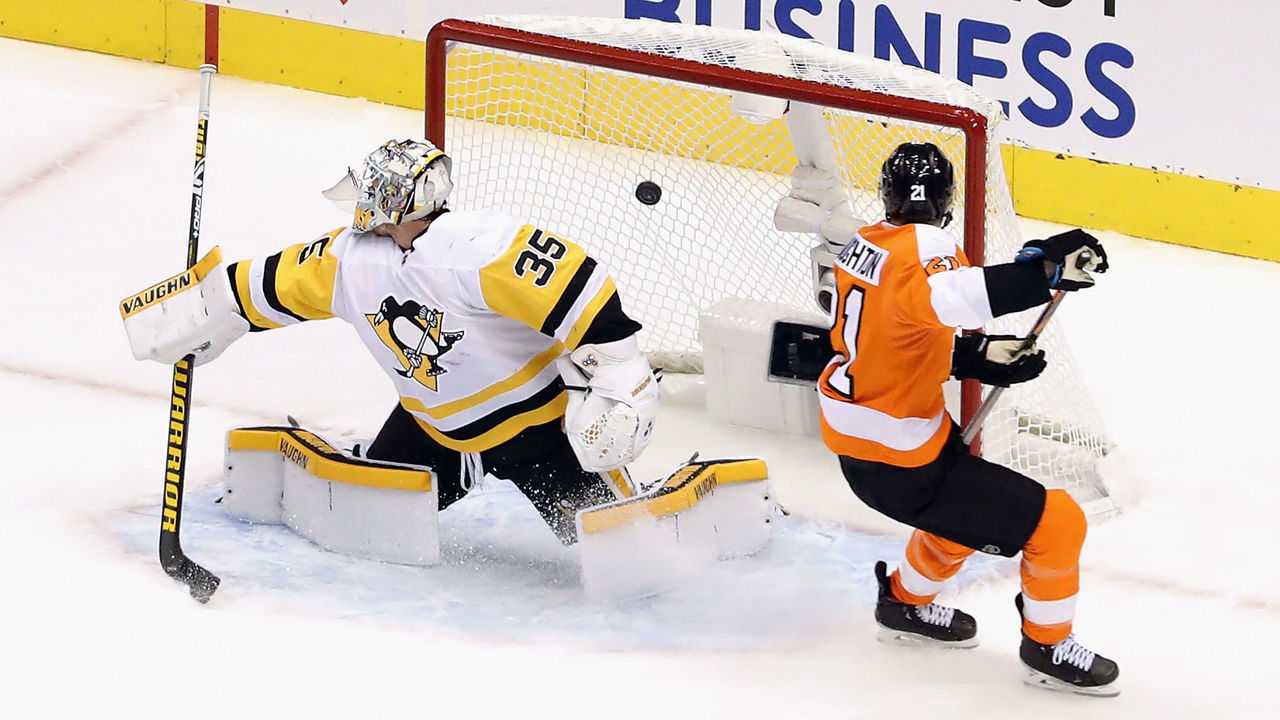 TORONTO, ONTARIO - JULY 28: Scott Laughton #21 of the Philadelphia Flyers scores the overtime game winning goal against Tristan Jarry #35 of the Pittsburgh Penguins in an exhibition game prior to the 2020 NHL Stanley Cup Playoffs at Scotiabank Arena on July 28, 2020 in Toronto, Ontario, Canada. The Flyers defeated the Penguins 3-2 in overtime.