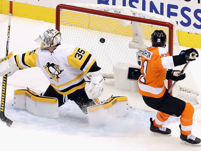 TORONTO, ONTARIO - JULY 28: Scott Laughton #21 of the Philadelphia Flyers scores the overtime game winning goal against Tristan Jarry #35 of the Pittsburgh Penguins in an exhibition game prior to the 2020 NHL Stanley Cup Playoffs at Scotiabank Arena on July 28, 2020 in Toronto, Ontario, Canada. The Flyers defeated the Penguins 3-2 in overtime.