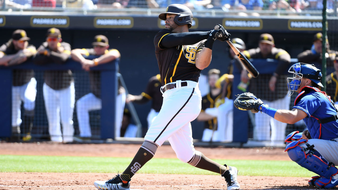 PEORIA, ARIZONA - MARCH 09: Tommy Pham #28 of the San Diego Padres follows through on a swing against the Los Angeles Dodgers during a spring training game at Peoria Stadium on March 09, 2020 in Peoria, Arizona.
