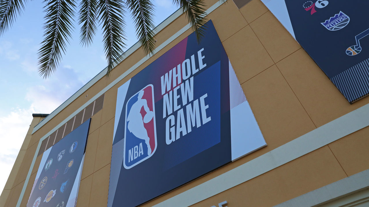ORLANDO, FL - JULY 16: An exterior shot of The Arena at ESPN Wide World of Sports with the "Whole New Game" signage during practice as part of the NBA Restart 2020 on July 16, 2020 in Orlando, Florida. NOTE TO USER: User expressly acknowledges and agrees that, by downloading and/or using this photograph, user is consenting to the terms and conditions of the Getty Images License Agreement. Mandatory Copyright Notice: Copyright 2020 NBAE