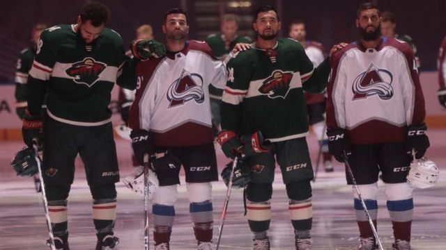 Players of color from Wild, Avalanche stand together during anthems