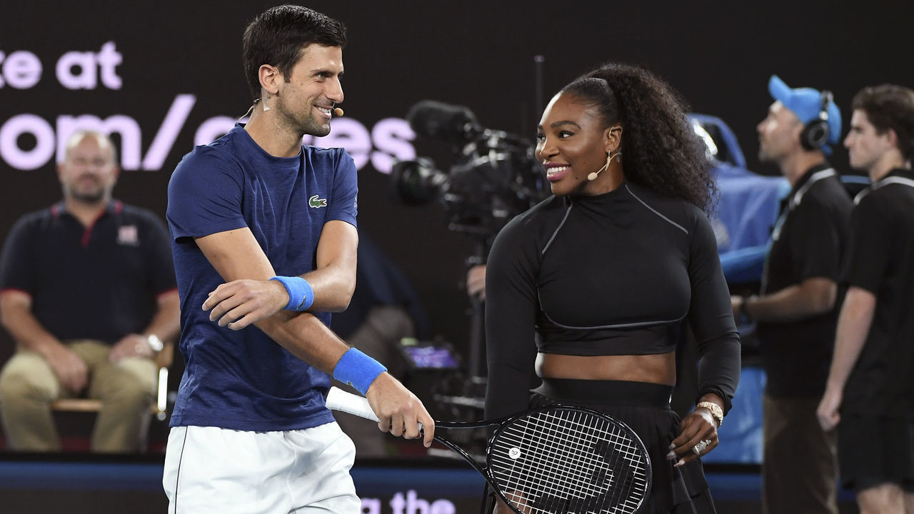 Serena Williams of the US and Novak Djokovic of Serbia share a lighter moment as they and other top players play in the Rally for Relief charity tennis match in support of the victims of the Australian bushfires, in Melbourne of January 15, 2020, ahead of the Australian Open tennis tournament.