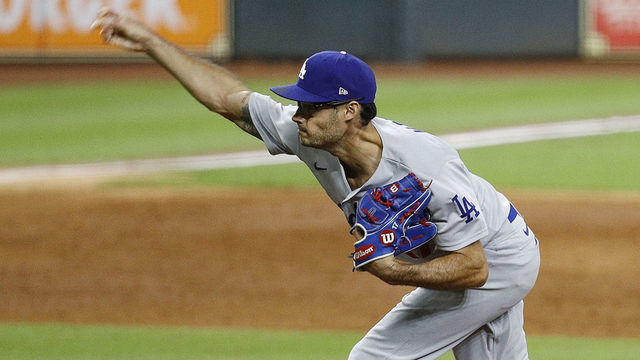 HOUSTON, TEXAS - JULY 28: Joe Kelly #17 of the Los Angeles Dodgers pitches against the Houston Astros in the sixth inning at Minute Maid Park on July 28, 2020 in Houston, Texas.