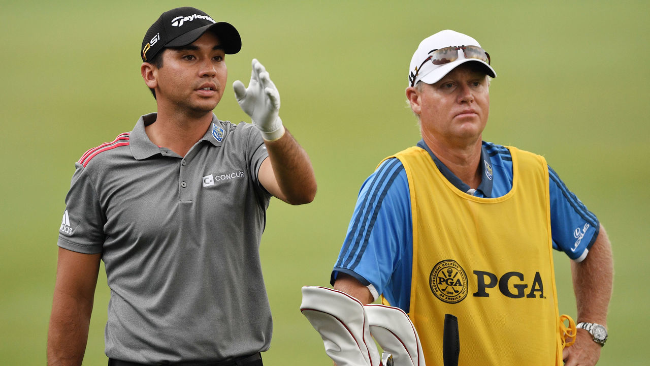 SPRINGFIELD, NJ - JULY 31: Jason Day of Australia talks to caddie Colin Swatton on the first hole during the continuation of the weather delayed third round of the 2016 PGA Championship at Baltusrol Golf Club on July 31, 2016 in Springfield, New Jersey.