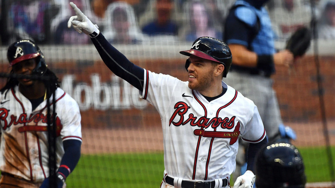 ATLANTA, GA - JULY 29: Freddie Freeman #5 of the Atlanta Braves celebrates after his two-run home run in the third inning against the Tampa Bay Rays at Truist Park on Wednesday, July 29, 2020 in Atlanta, Georgia.