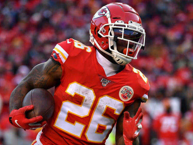 KANSAS CITY, MISSOURI - JANUARY 19: Damien Williams #26 of the Kansas City Chiefs runs with the ball in the second half against the Tennessee Titans in the AFC Championship Game at Arrowhead Stadium on January 19, 2020 in Kansas City, Missouri.