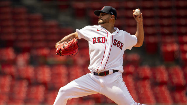BOSTON, MA - JULY 25: Martin Perez #54 of the Boston Red Sox delivers during the first inning of a game against the Baltimore Orioles on July 25, 2020 at Fenway Park in Boston, Massachusetts. The Major League Baseball season was delayed due to the coronavirus pandemic.