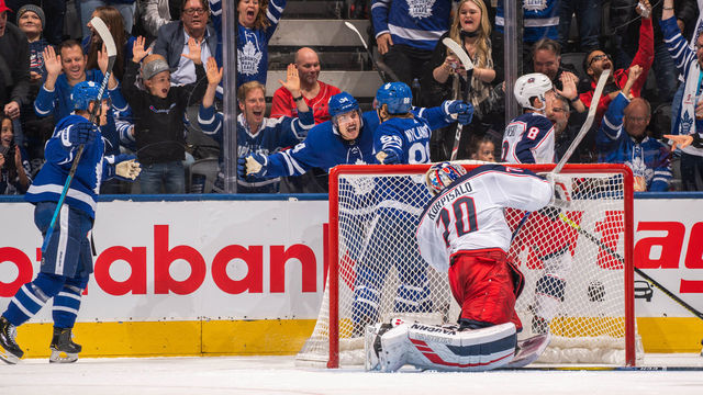 TORONTO, ON - OCTOBER 21: William Nylander #88 of the Toronto Maple Leafs celebrates his goal with Auston Matthews #34 against Joonas Korpisalo #70 of the Columbus Blue Jackets during the second period at the Scotiabank Arena on October 21, 2019 in Toronto, Ontario, Canada.