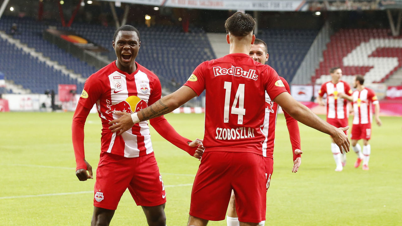 SALZBURG, AUSTRIA - JUNE 14: Patson Daka of Salzburg celebrates with scorer Dominik Szoboszlai of Salzburg after his goal during the tipico Bundesliga match between Red Bull Salzburg and LASK at Red Bull Arena on June 14, 2020 in Salzburg, Austria.