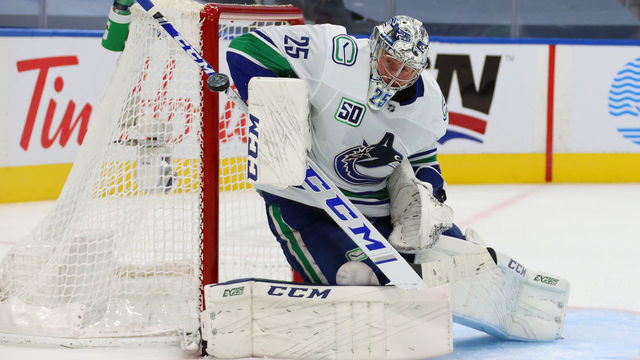 EDMONTON, ALBERTA - JULY 29: Goaltender Jacob Markstrom #25 of the Vancouver Canucks makes a save during the second period of an exhibition game against the Winnipeg Jets prior to the 2020 NHL Stanley Cup Playoffs at Rogers Place on July 29, 2020 in Edmonton, Alberta.