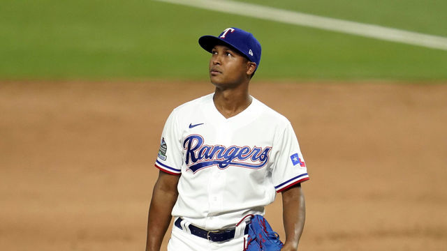ARLINGTON, TX - JULY 24: José Leclerc #25 of the Texas Rangers looks on during the game between the Colorado Rockies and the Texas Rangers at Globe Life Field in Arlington on Friday, July 24, 2020 in Arlington, Texas.