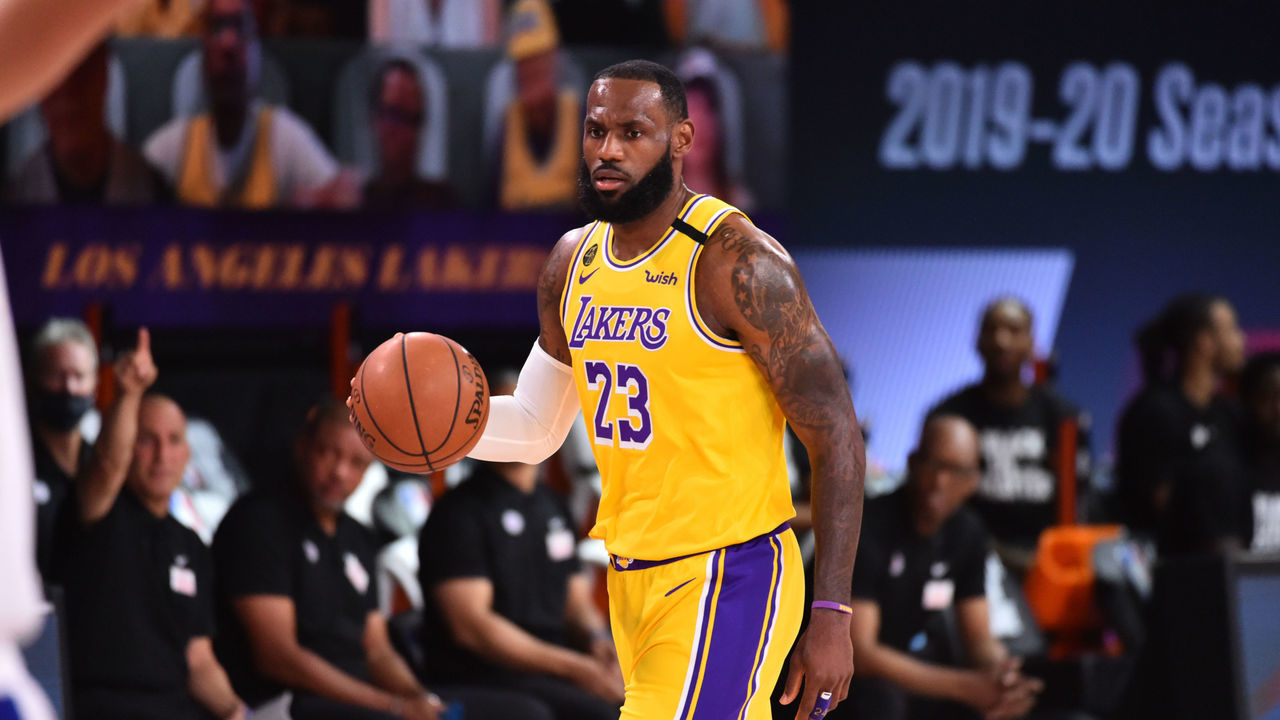 Orlando, FL - JULY 30: LeBron James #23 of the Los Angeles Lakers handles the ball against the LA Clippers on July 30, 2020 at The Arena at ESPN Wide World Of Sports Complex in Orlando, Florida. NOTE TO USER: User expressly acknowledges and agrees that, by downloading and/or using this Photograph, user is consenting to the terms and conditions of the Getty Images License Agreement. Mandatory Copyright Notice: Copyright 2020 NBAE