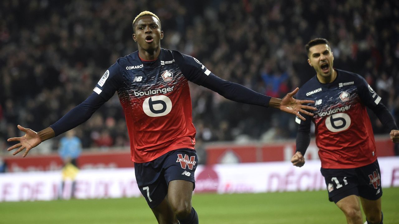 Lille's Nigerian forward Victor Osimhen (L) celebrates after scoring during the French L1 football match between Lille (LOSC) and Brest at the Pierre Mauroy stadium in Villeneuve-d'Ascq, northern France on December 6, 2019.