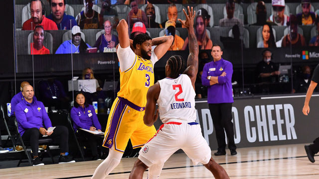 Orlando, FL - JULY 30: Anthony Davis #3 of the Los Angeles Lakers handles the ball against Kawhi Leonard #2 of the LA Clippers on July 30, 2020 at The Arena at ESPN Wide World Of Sports Complex in Orlando, Florida. NOTE TO USER: User expressly acknowledges and agrees that, by downloading and/or using this Photograph, user is consenting to the terms and conditions of the Getty Images License Agreement. Mandatory Copyright Notice: Copyright 2020 NBAE