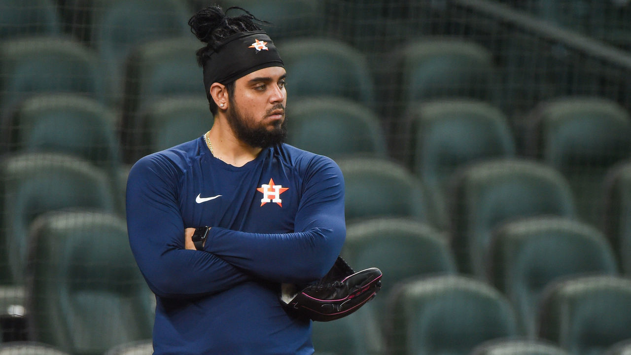 HOUSTON, TX - JULY 16: Houston Astros pitcher, Roberto Osuna (54) watches batting practice from behind the cage during Astros Summer Camp at Minute Maid Park on Thursday, July 16, 2020 in Houston, TX.