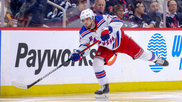 WINNIPEG, MB - FEBRUARY 11: Tony DeAngelo #77 of the New York Rangers plays the puck down the ice during third period action against the Winnipeg Jets at the Bell MTS Place on February 11, 2020 in Winnipeg, Manitoba, Canada.