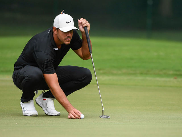 MEMPHIS, TN - JULY 31: Brooks Koepka lines up his putt on the 10th green during the second round of the World Golf Championships-FedEx St. Jude Invitational at TPC Southwind on July 31, in Memphis, Tennessee.