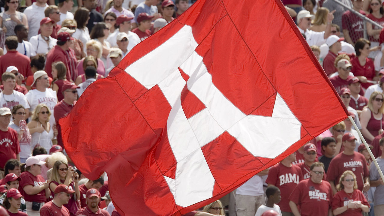 Alabama Crimson Tide flag is flown around the stadium during a 24 to 13 win over the Arkansas Razorbacks on September 24, 2005 at Bryant-Denny Stadium in Tuscaloosa, Alabama.