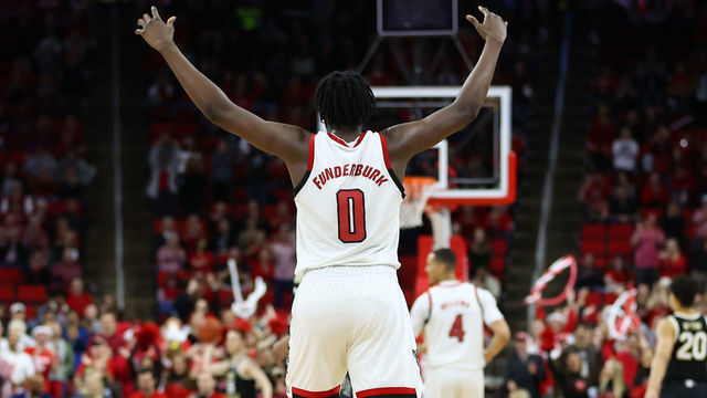 RALEIGH, NC - MARCH 06: North Carolina State Wolfpack forward DJ Funderburk (0) celebrates during the 2nd half of the NC State Wolfpack game versus the Wake Forest Demon Deacons on March 6th, 2020 at PNC Arena in Raleigh, NC.