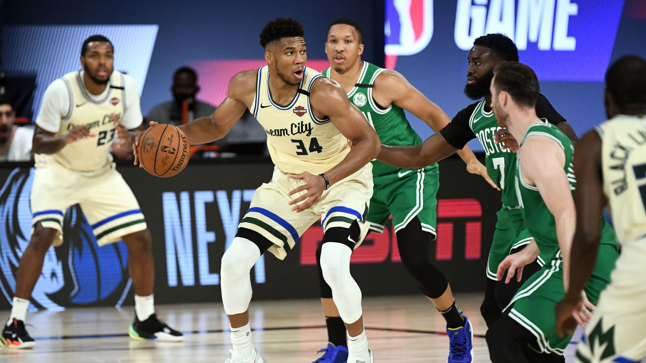 Orlando, FL - JULY 31: Giannis Antetokounmpo #34 of the Milwaukee Bucks handles the ball during the game against the Boston Celtics on July 31, 2020 at The HP Field House at ESPN Wide World Of Sports Complex in Orlando, Florida. NOTE TO USER: User expressly acknowledges and agrees that, by downloading and/or using this Photograph, user is consenting to the terms and conditions of the Getty Images License Agreement. Mandatory Copyright Notice: Copyright 2020 NBAE