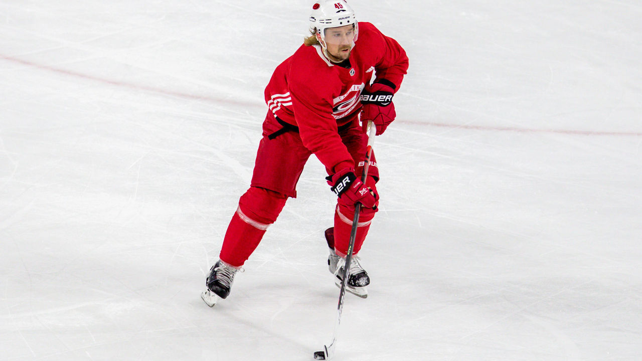 RALEIGH, NC - JULY 23: Carolina Hurricanes defenseman Sami Vatanen (45) rushes the puck up the ice during the Carolina Hurricanes practice as they prepare for the 2020 post season on July 23, 2020 at the PNC Arena in Raleigh, NC.