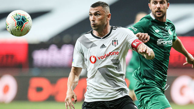 ISTANBUL, TURKEY - JUNE 26: Burak Yilmaz (L) of Besiktas in action during Turkish Super Lig week 29 soccer match between Besiktas and Ittifak Holding Konyaspor at Vodafone Park in Istanbul, Turkey on June 26, 2020.