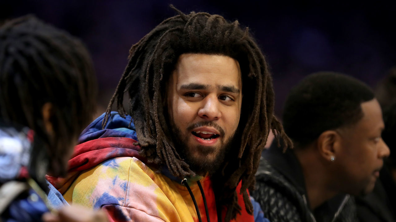 CHARLOTTE, NORTH CAROLINA - FEBRUARY 17: J. Cole watches the action during the NBA All-Star game as part of the 2019 NBA All-Star Weekend at Spectrum Center on February 17, 2019 in Charlotte, North Carolina. NOTE TO USER: User expressly acknowledges and agrees that, by downloading and/or using this photograph, user is consenting to the terms and conditions of the Getty Images License Agreement.