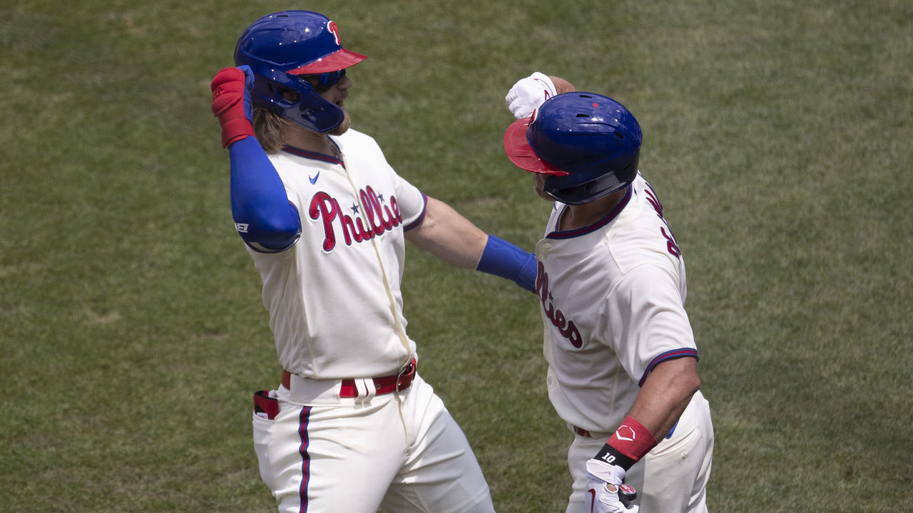 PHILADELPHIA, PA - JULY 26: Bryce Harper #3 of the Philadelphia Phillies celebrates with J.T. Realmuto #10 after hitting a three run home run in the bottom of the first inning against the Miami Marlins at Citizens Bank Park on July 26, 2020 in Philadelphia, Pennsylvania.