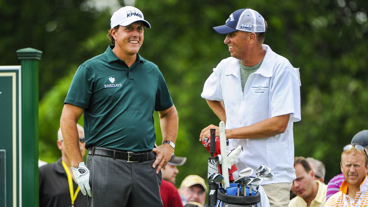 DUBLIN, OH - JUNE 02: Phil Mickelson shares a laugh with caddie Jim "Bones" Mackay before teeing off on the first hole during the first round of the Memorial Tournament presented by Nationwide at Muirfield Village Golf Club on June 2, 2016 in Dublin, Ohio.