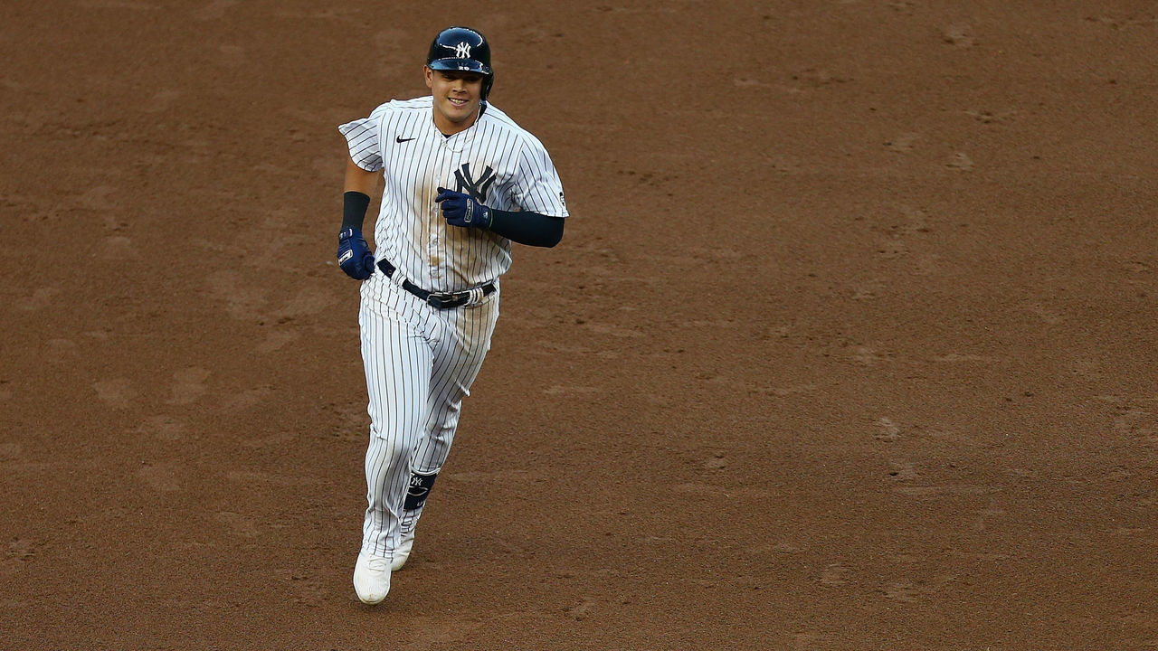 NEW YORK, NEW YORK - AUGUST 01: Gio Urshela #29 of the New York Yankees smiles after hitting a second inning grand slam home run against the Boston Red Sox at Yankee Stadium on August 01, 2020 in New York City.