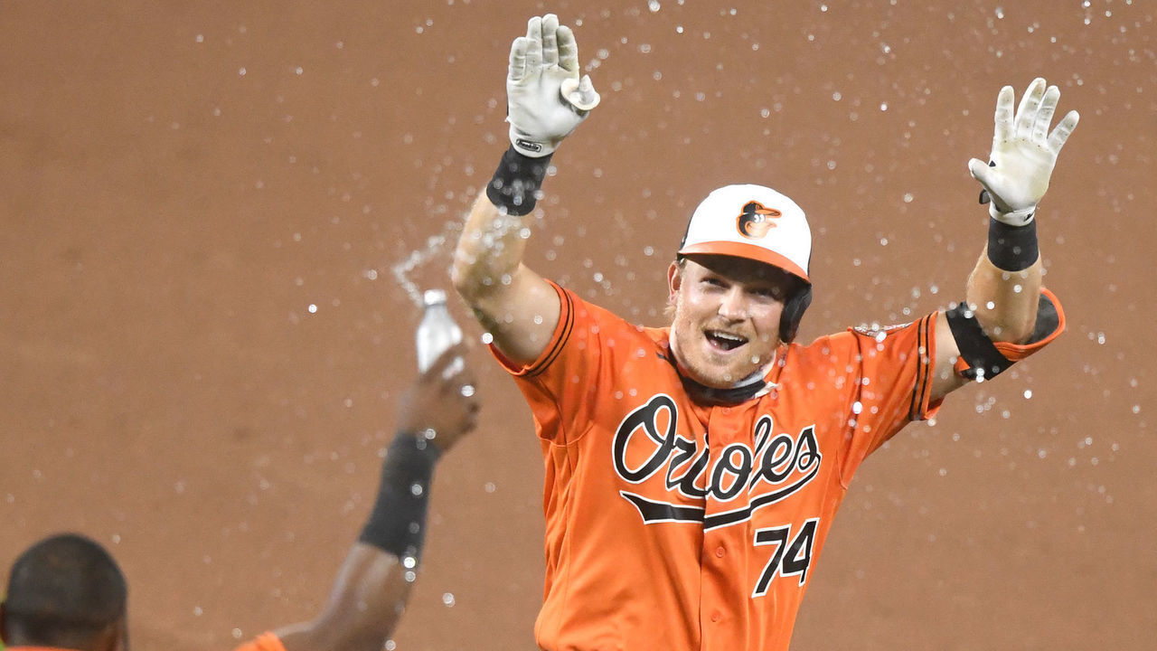 BALTIMORE, MD - AUGUST 01: Pat Valaika #74 of the Baltimore Orioles reacts after making a game-winning hit in the eleventh inning to score Bryan Holaday #35 (not pictured) during a baseball game against the Tampa Bay Rays on August 1, 2020 at Oriole Park at Camden Yards in Baltimore, Maryland.