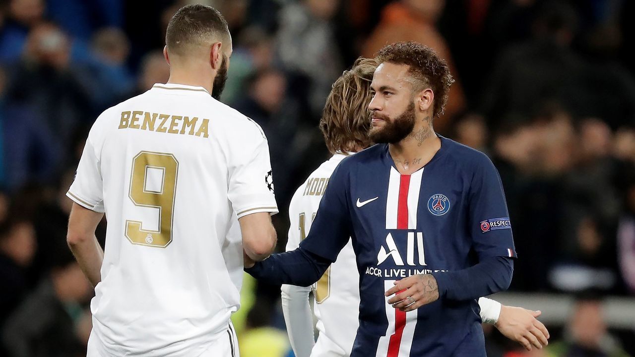 MADRID, SPAIN - NOVEMBER 26: Benzema of Real Madrid speaks with Neymar of PSG at the end of the UEFA Champions League Group A soccer match between Real Madrid and Paris Saint-Germain at the Santiago Bernabeu Stadium in Madrid, Spain on November 26, 2019.