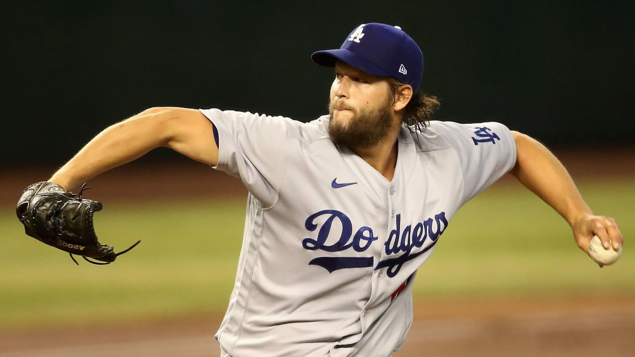 PHOENIX, ARIZONA - AUGUST 02: Starting pitcher Clayton Kershaw #22 of the Los Angeles Dodgers throws a pitch against the Arizona Diamondbacks during the first inning of the MLB game at Chase Field on August 02, 2020 in Phoenix, Arizona.