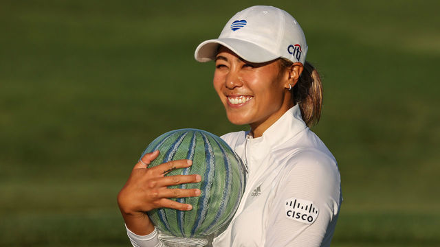TOLEDO, OHIO - AUGUST 02: Danielle Kang celebrates with the trophy on the 18th green after her -7 under par final round victory in the LPGA Drive On Championship at Inverness Club on August 2, 2020 in Toledo, Ohio.