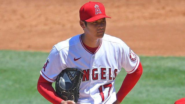 ANAHEIM, CA - AUGUST 02: Shohei Ohtani #17 waits on the mound to be pulled from the game by manager Joe Maddon #70 of the Los Angeles Angels after giving up back to back bases loaded walks the the Houston Astros in the second inning of the game at Angel Stadium of Anaheim on August 2, 2020 in Anaheim, California.